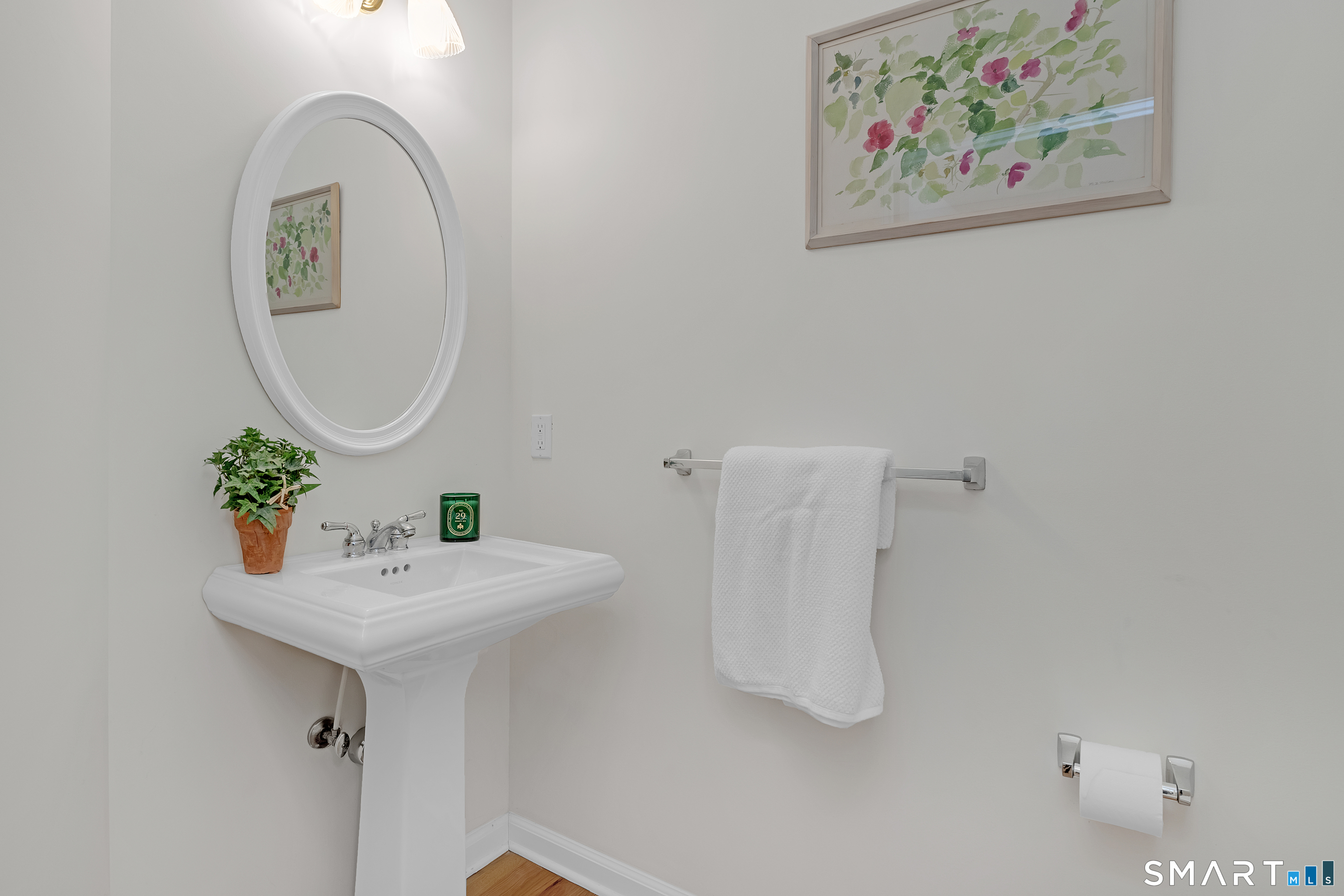 9 Pear Orchard Road, Unit 9 Portland, CT 06480 - Photo 28 of 38 a bathroom with a sink and a mirror