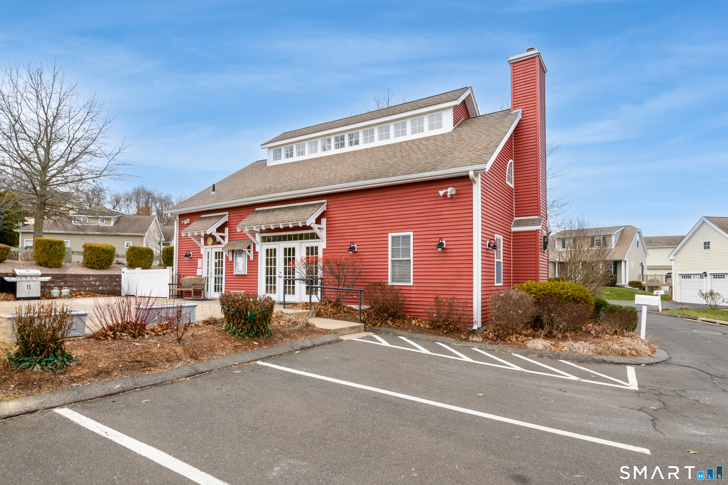 9 Pear Orchard Road, Unit 9 Portland, CT 06480 - Photo 33 of 38 a front view of a building with street view