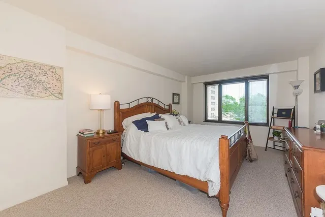 a bathroom with a sink a mirror and shower view