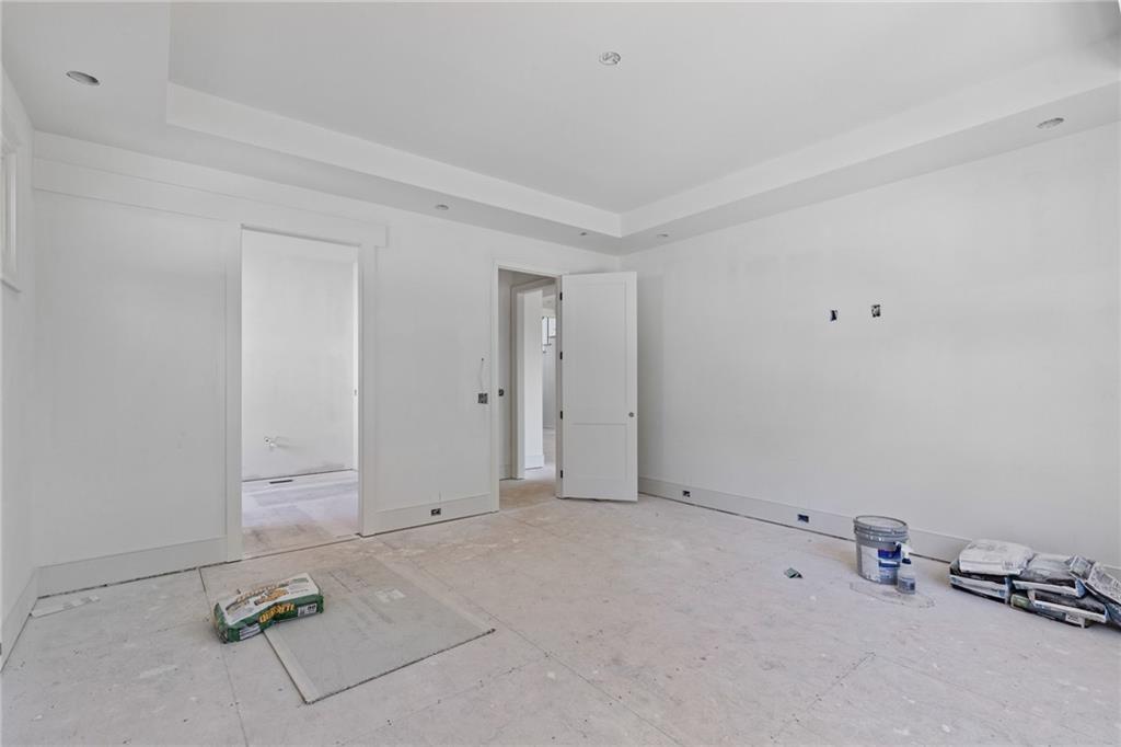 10908 Woodstock Road Roswell, GA 30075 - Photo 14 of 20 an empty room with windows