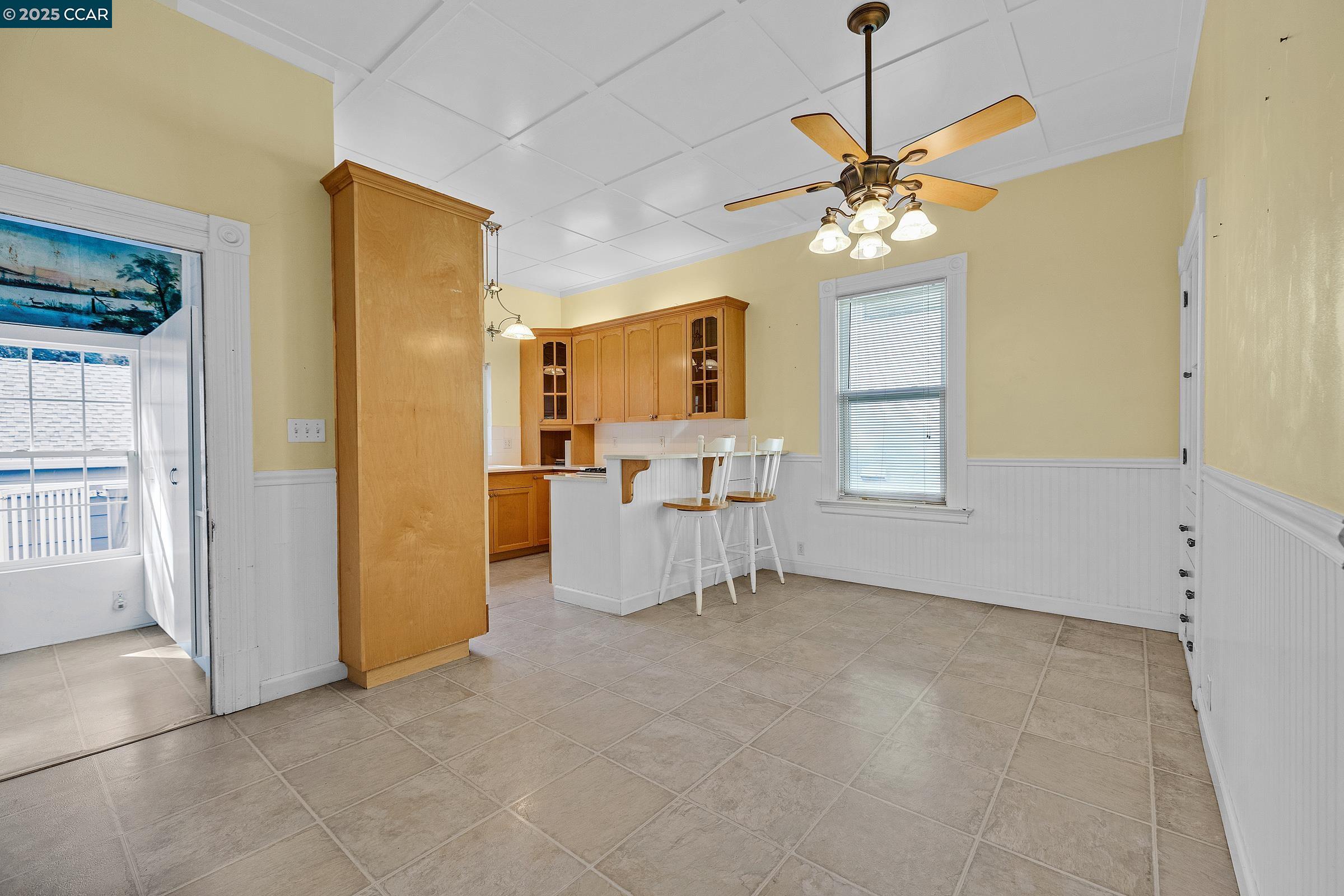 610 Quinan Street Pinole, CA 94564 - Photo 15 of 41 a view of a livingroom with a chandelier furniture and windows