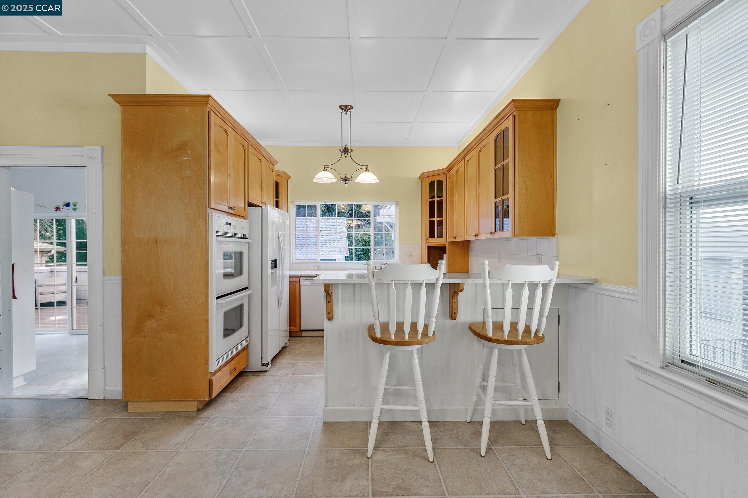 610 Quinan Street Pinole, CA 94564 - Photo 16 of 41 a view of kitchen with furniture and windows