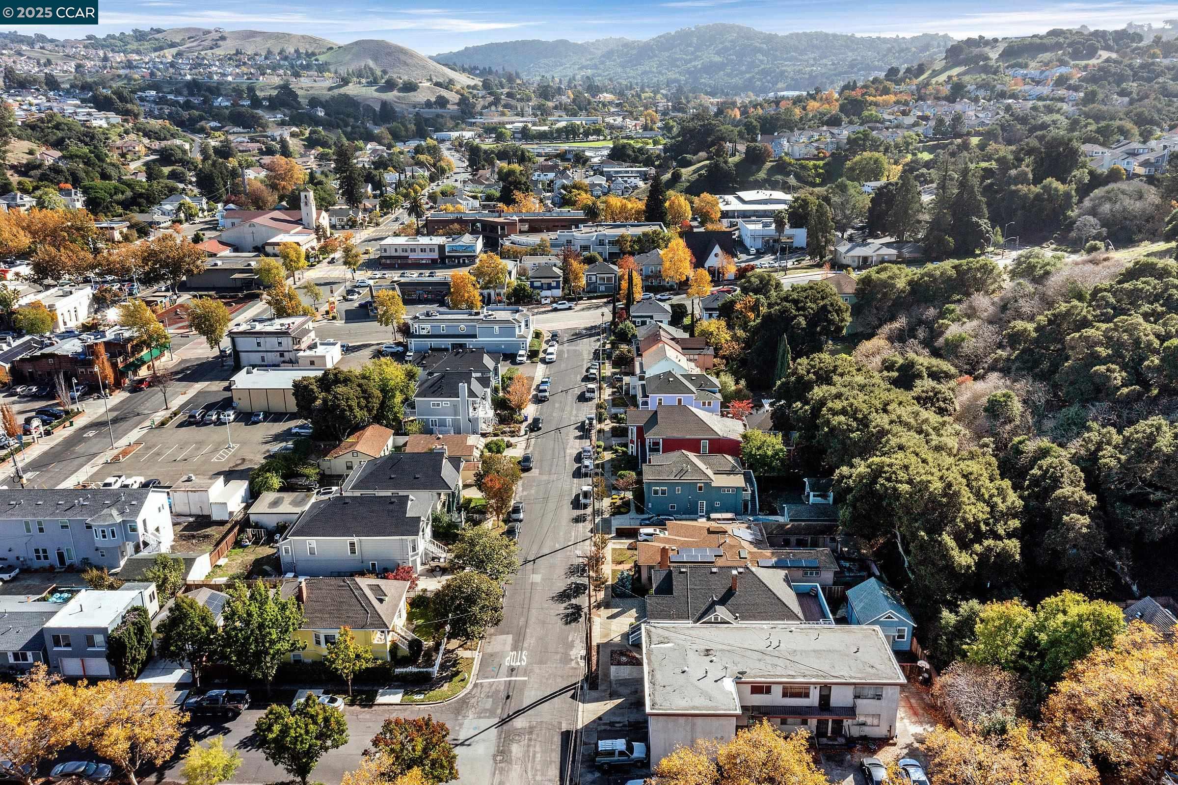 610 Quinan Street Pinole, CA 94564 - Photo 37 of 41 an aerial view of residential houses with city view