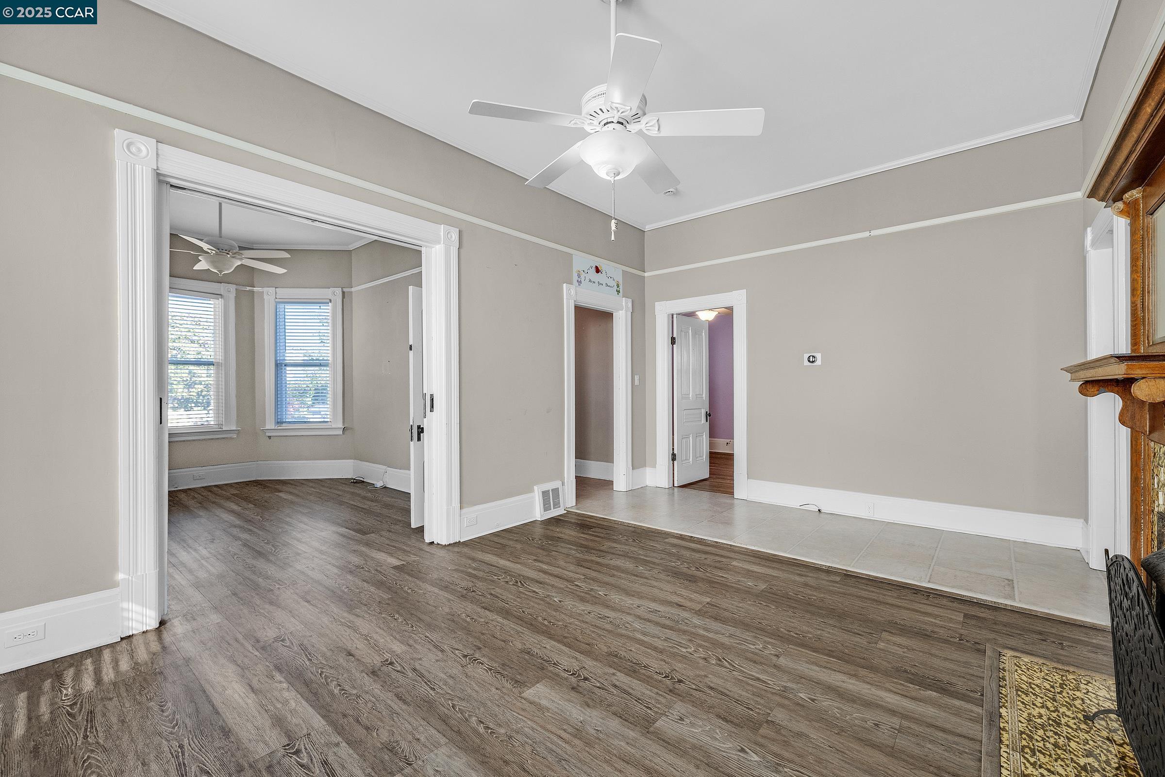 610 Quinan Street Pinole, CA 94564 - Photo 5 of 41 a view of an empty room with wooden floor