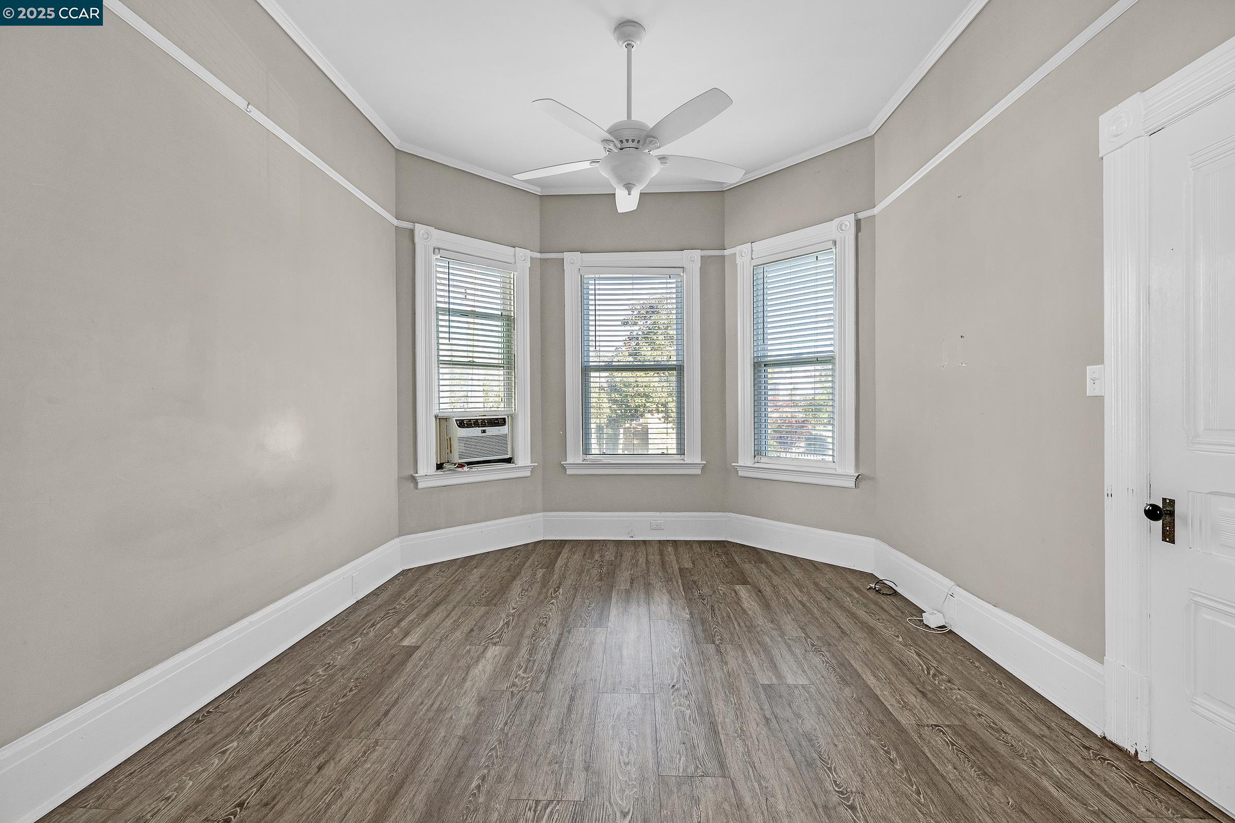 610 Quinan Street Pinole, CA 94564 - Photo 6 of 41 a view of wooden floor and windows in a room