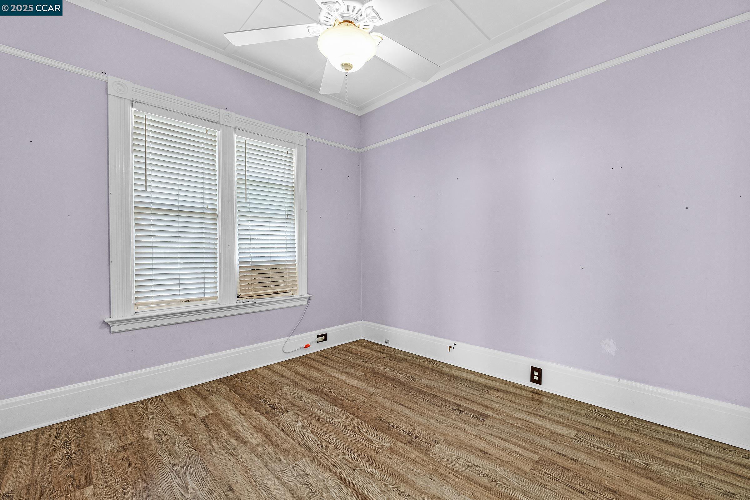 610 Quinan Street Pinole, CA 94564 - Photo 9 of 41 wooden floor in an empty room with a window