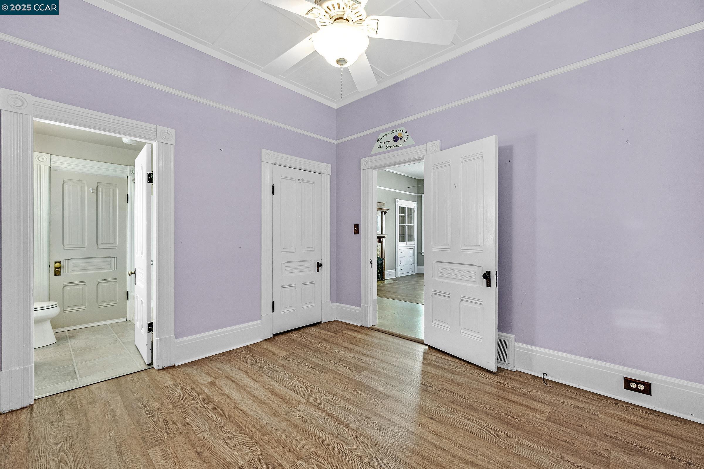 610 Quinan Street Pinole, CA 94564 - Photo 10 of 41 wooden floor in an empty room with a bathroom