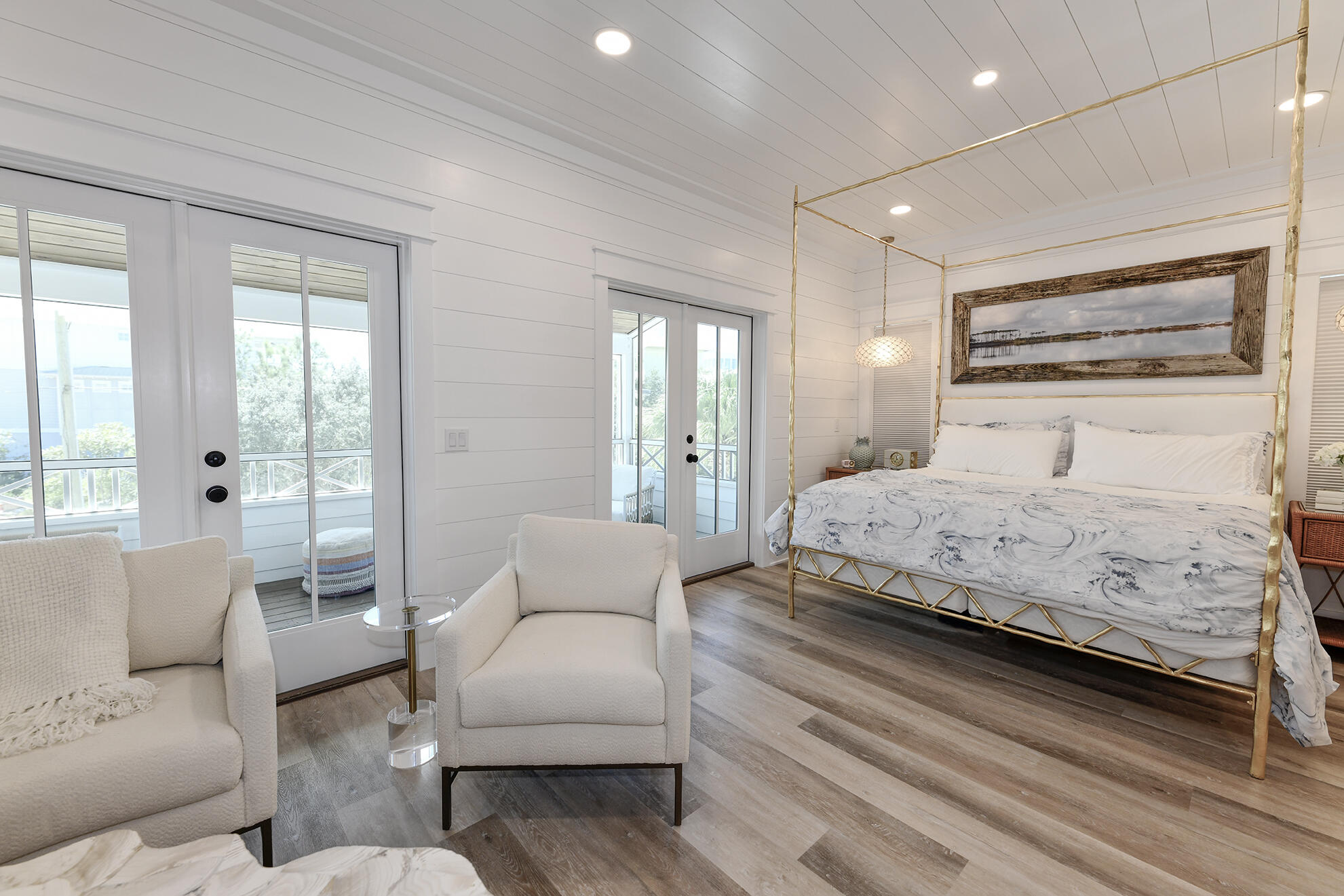 20 Brown Street Santa Rosa Beach, FL 32459 - Photo 27 of 83 a bedroom with a large bed couch and windows