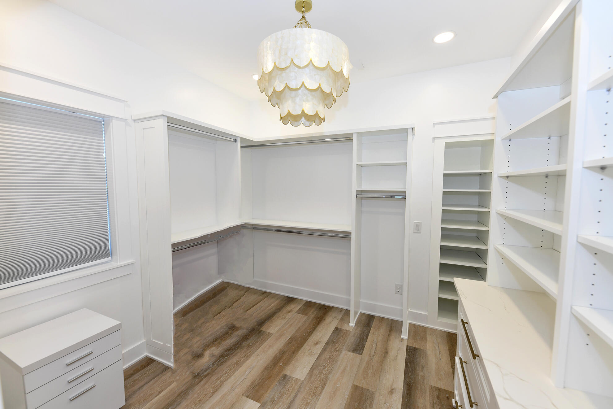 20 Brown Street Santa Rosa Beach, FL 32459 - Photo 28 of 83 a view of walk in closet with empty racks