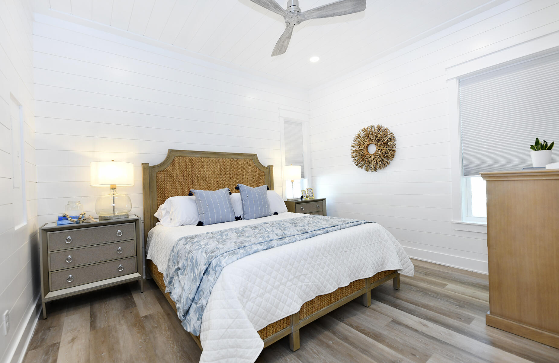 20 Brown Street Santa Rosa Beach, FL 32459 - Photo 37 of 83 a bedroom with a bed and painting on the wall