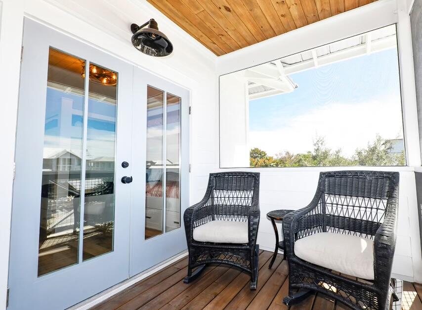 20 Brown Street Santa Rosa Beach, FL 32459 - Photo 63 of 83 a balcony with table and chairs