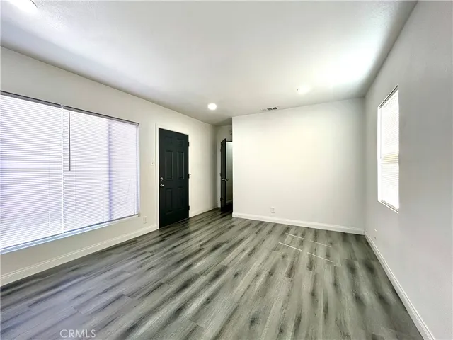 a bathroom with a sink a mirror and a shower