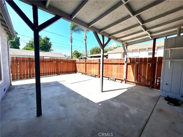 a view of a room with a large window