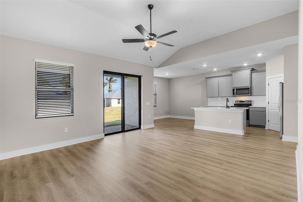 2426 Hiers Road Dover, FL 33527 - Photo 4 of 8 a view of a kitchen with a sink and a window