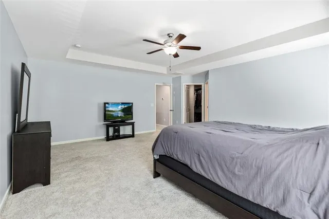 a spacious bathroom with a double vanity sink mirror and double