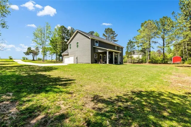 a view of a house with a swimming pool