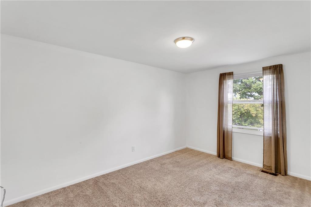 25 Pheasant Run Drive Export, PA 15632 - Photo 16 of 25 an empty room with windows