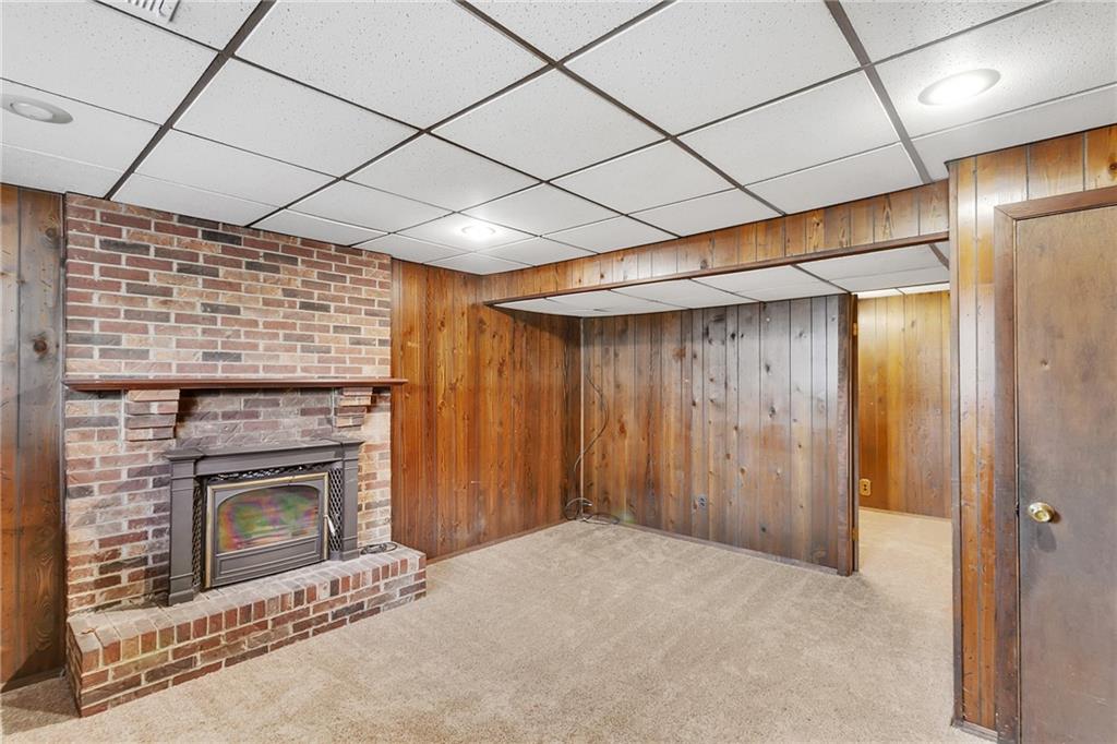 25 Pheasant Run Drive Export, PA 15632 - Photo 18 of 25 a big room with closet and a fireplace