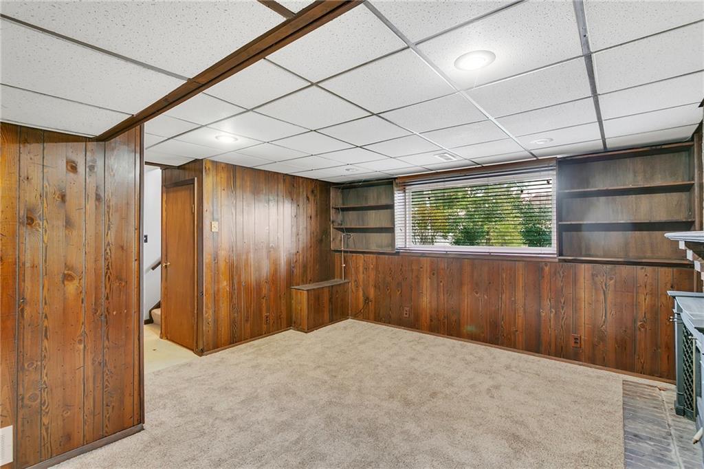 25 Pheasant Run Drive Export, PA 15632 - Photo 19 of 25 a view of a room with wooden walls and windows
