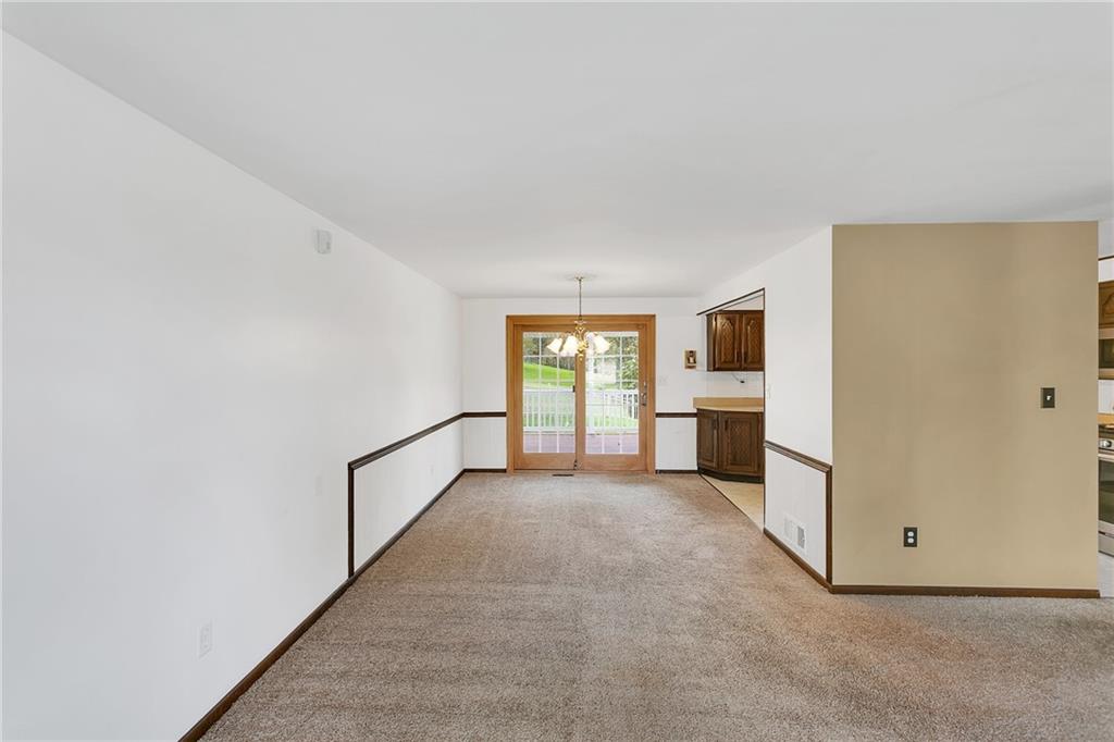25 Pheasant Run Drive Export, PA 15632 - Photo 4 of 25 a view of an empty room with a kitchen
