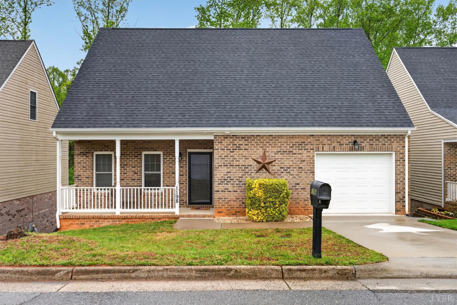 1198 Crest Ridge Drive Bedford, VA 24523 - Photo 1 of 40 a front view of a house