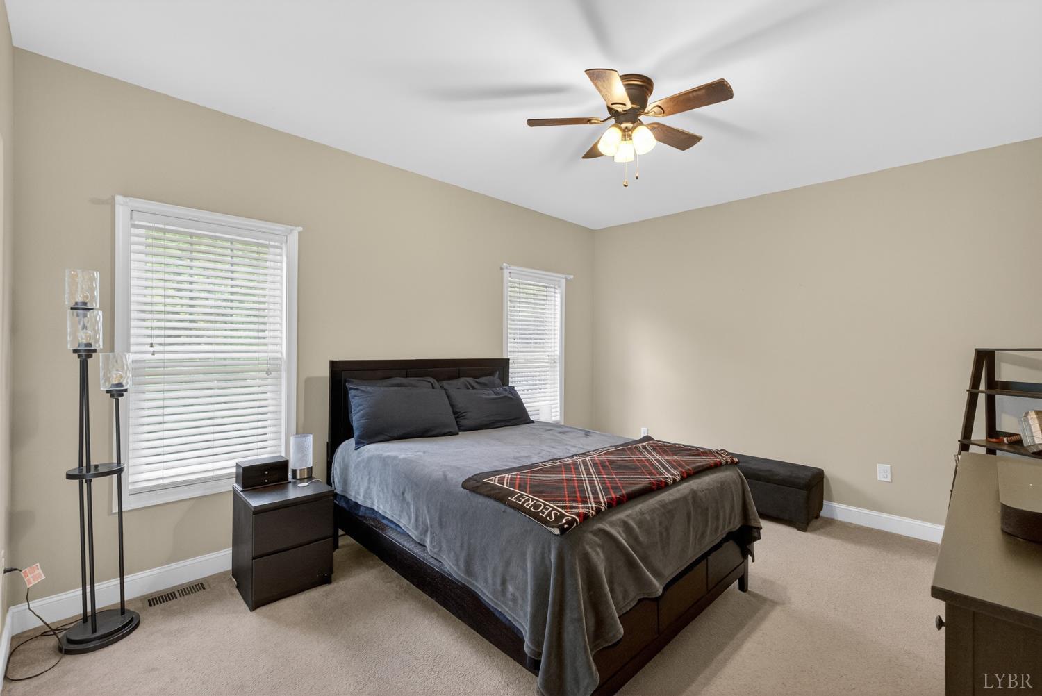 1198 Crest Ridge Drive Bedford, VA 24523 - Photo 13 of 40 a bedroom with a bed and window