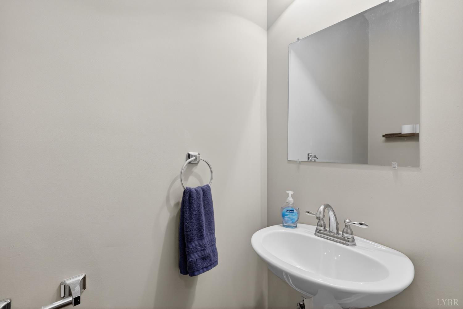 1198 Crest Ridge Drive Bedford, VA 24523 - Photo 20 of 40 a bathroom with a sink and a mirror