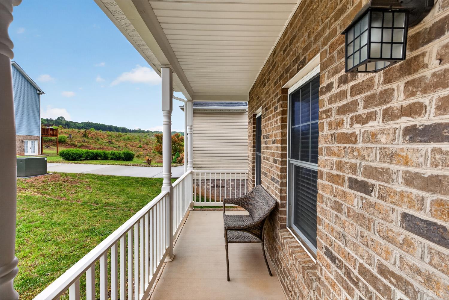 1198 Crest Ridge Drive Bedford, VA 24523 - Photo 29 of 40 a view of a porch with a yard