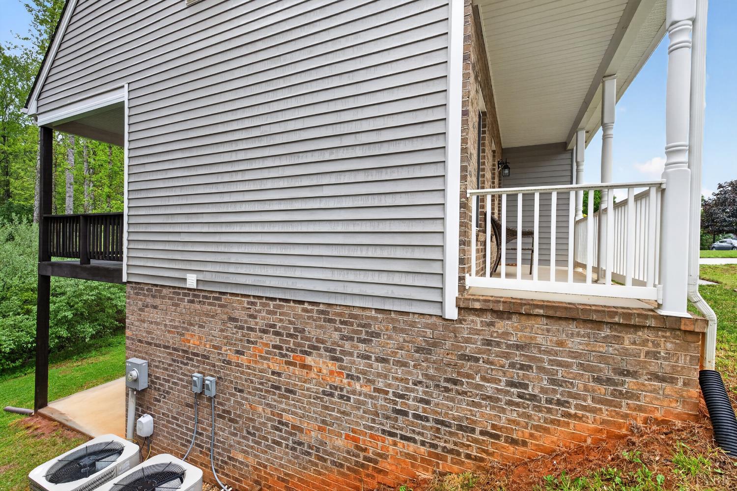 1198 Crest Ridge Drive Bedford, VA 24523 - Photo 30 of 40 a view of a house with a small yard