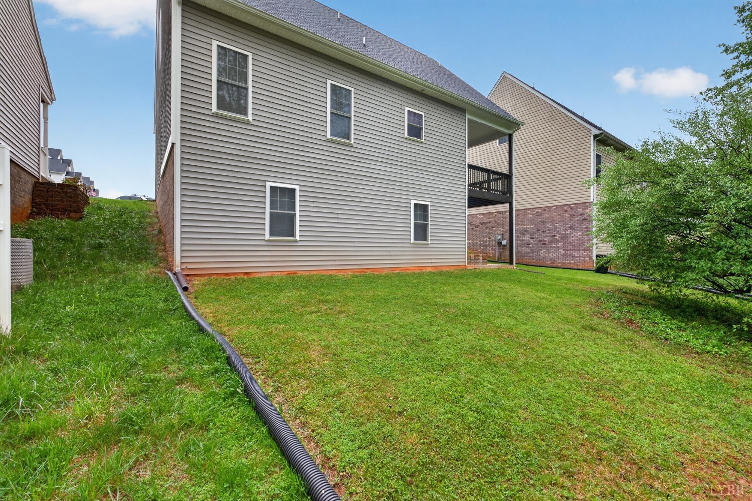 1198 Crest Ridge Drive Bedford, VA 24523 - Photo 33 of 40 a house view with a garden space