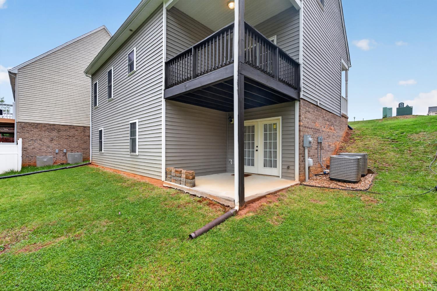 1198 Crest Ridge Drive Bedford, VA 24523 - Photo 35 of 40 a view of a house with backyard and porch