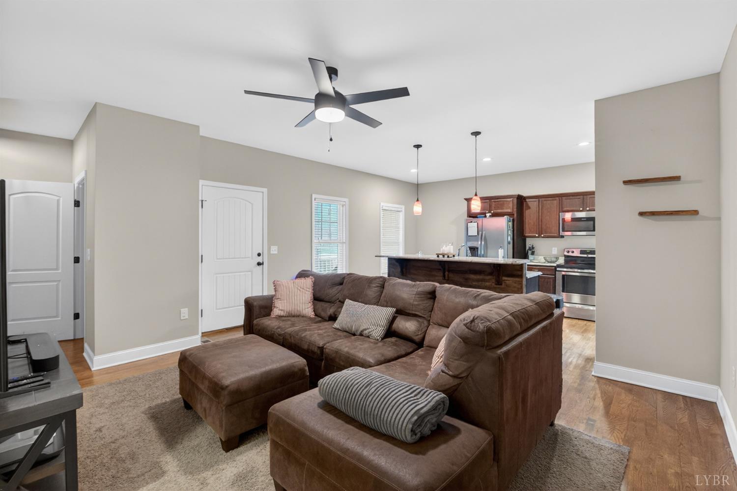 1198 Crest Ridge Drive Bedford, VA 24523 - Photo 9 of 40 a living room with furniture and kitchen view