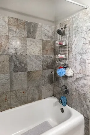 a bathroom with a sink and a shower