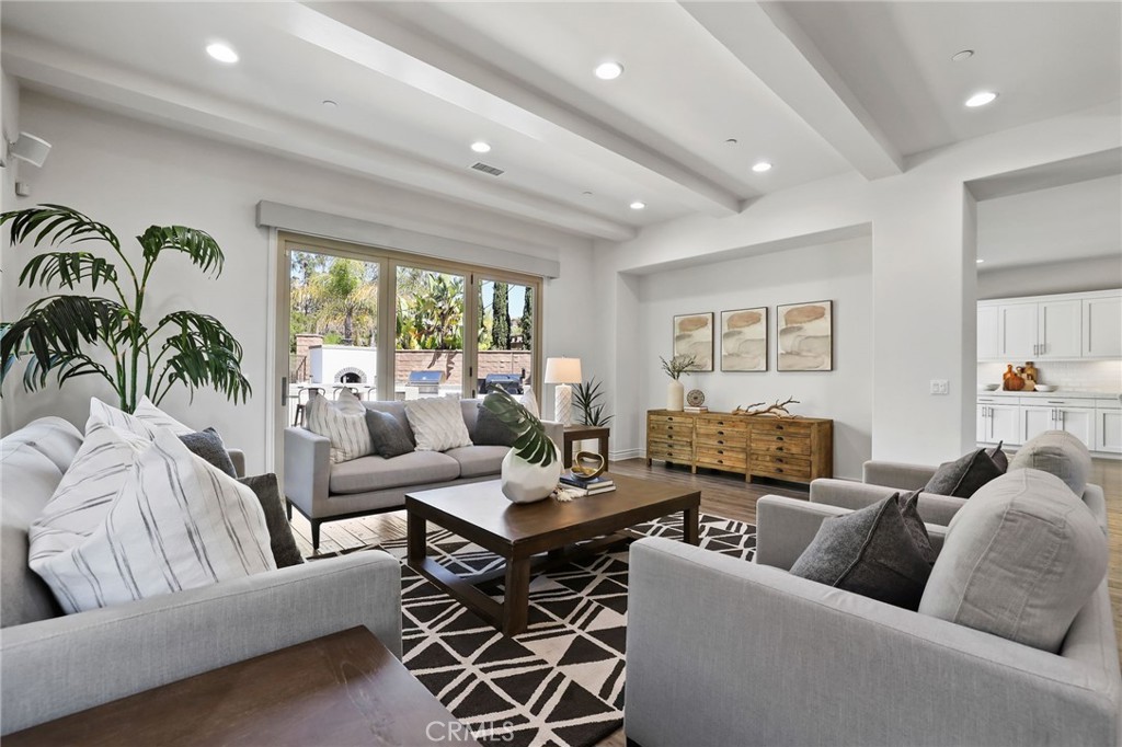 49 Saddlehorn Irvine, CA 92602 - Photo 11 of 73 a living room with furniture and a large window