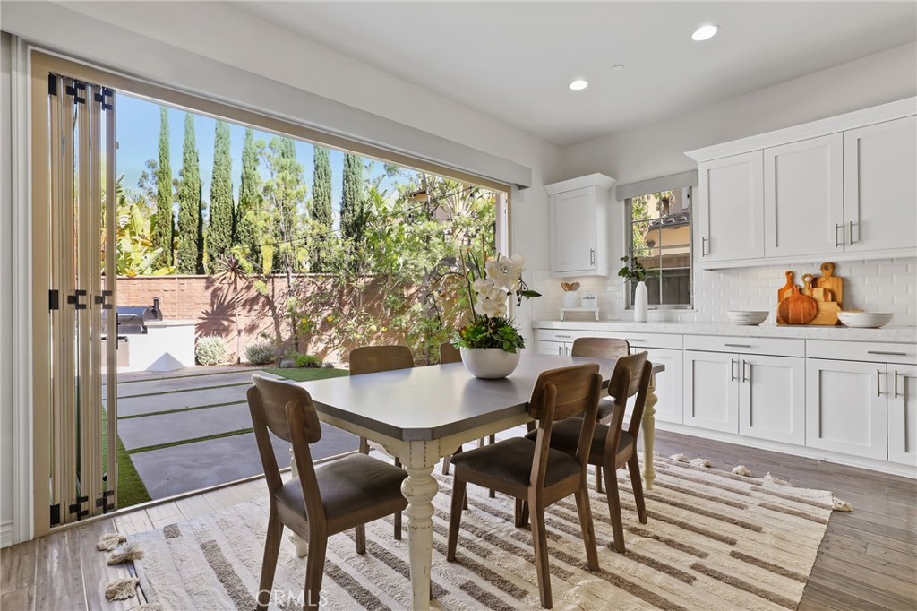 49 Saddlehorn Irvine, CA 92602 - Photo 24 of 73 a view of a dining room with furniture window and outside view