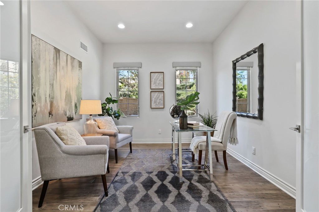 49 Saddlehorn Irvine, CA 92602 - Photo 27 of 73 a living room with furniture and a window