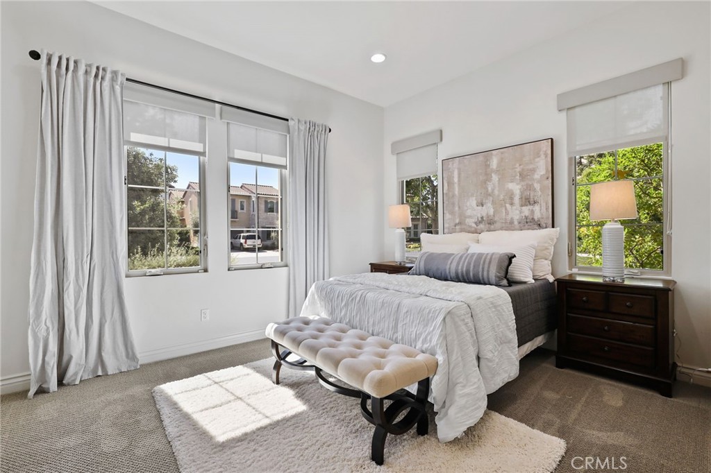 49 Saddlehorn Irvine, CA 92602 - Photo 28 of 73 a bedroom with a bed and a window