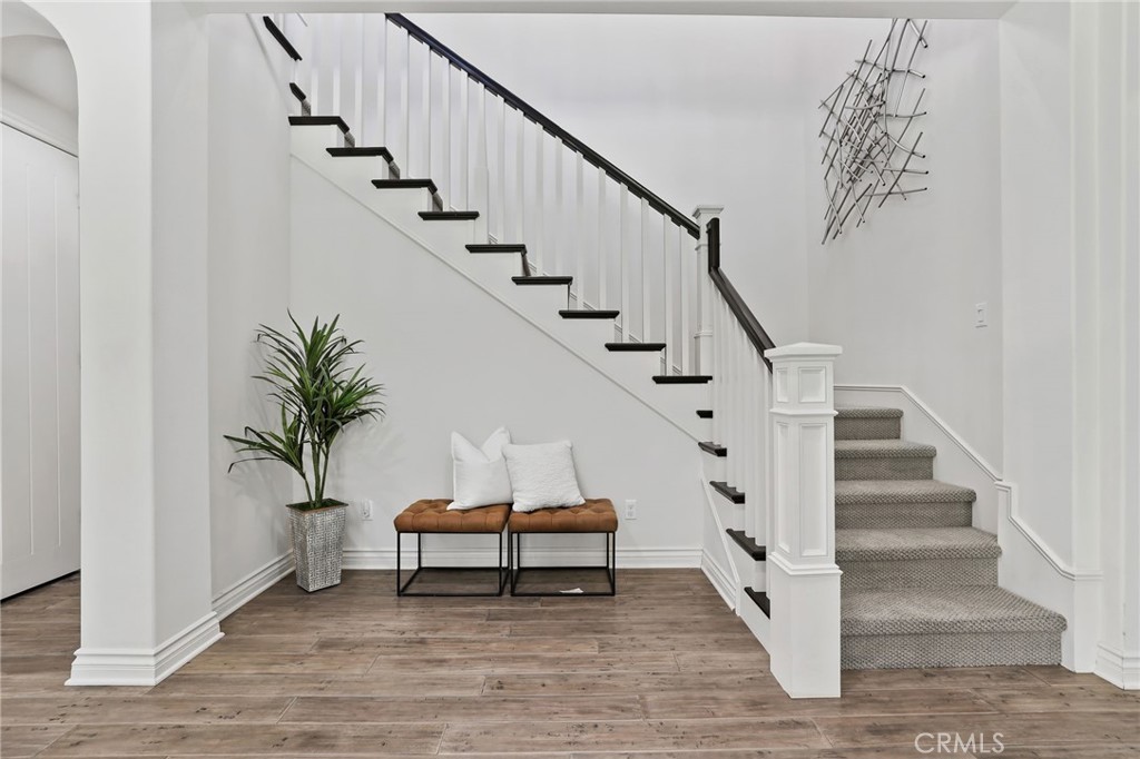 49 Saddlehorn Irvine, CA 92602 - Photo 30 of 73 a view of entryway and hall with wooden floor