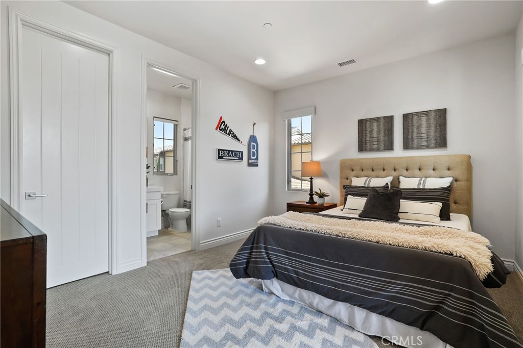 49 Saddlehorn Irvine, CA 92602 - Photo 42 of 73 a bedroom with a bed and window