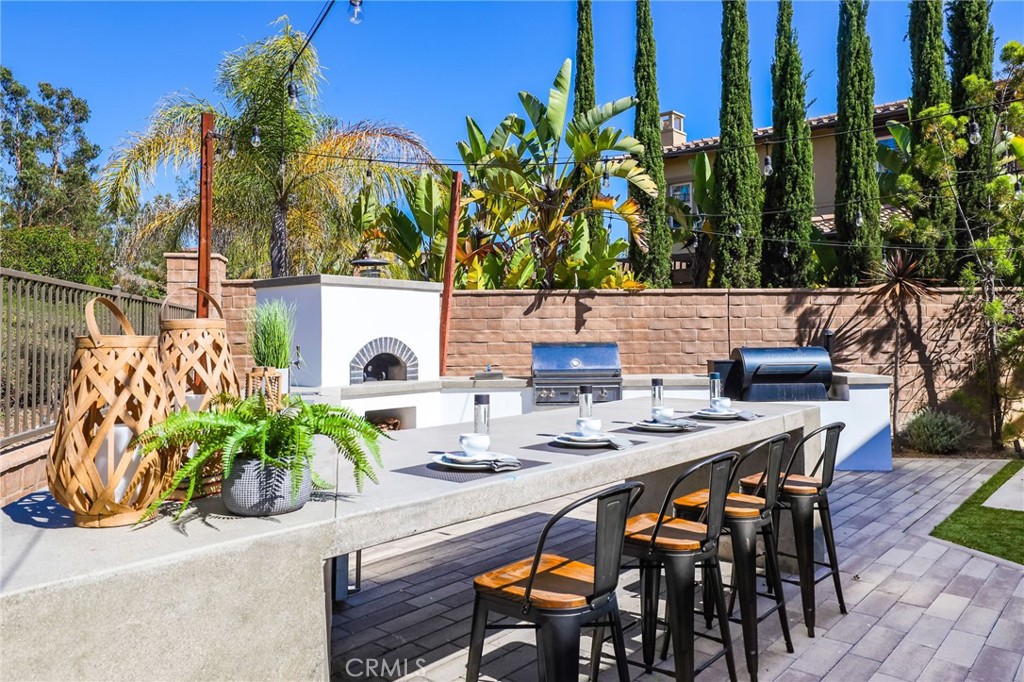 49 Saddlehorn Irvine, CA 92602 - Photo 48 of 73 a view of an outdoor dining space with furniture