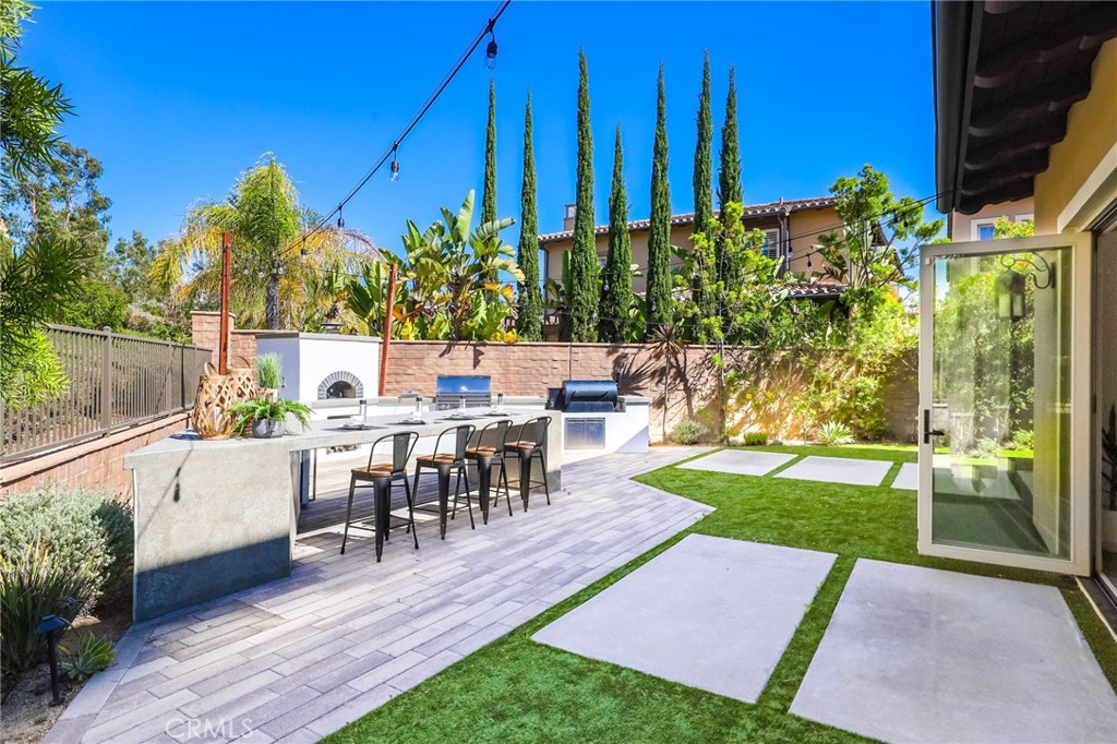 49 Saddlehorn Irvine, CA 92602 - Photo 49 of 73 a view of a backyard with plants and patio