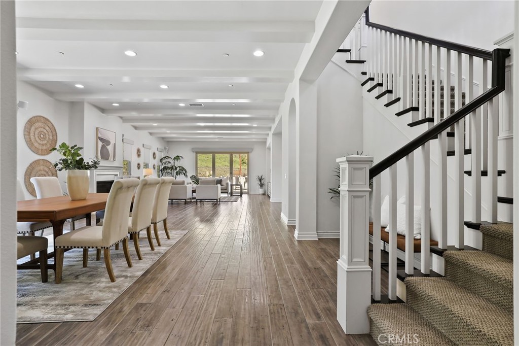 49 Saddlehorn Irvine, CA 92602 - Photo 5 of 73 a view of a dining room with furniture and wooden floor