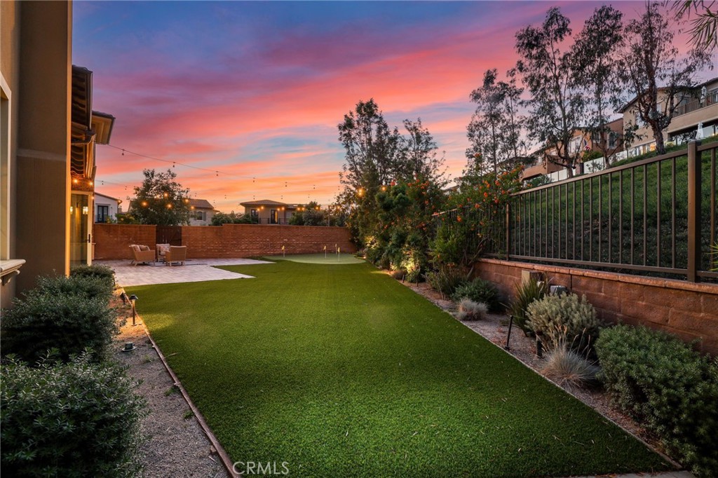 49 Saddlehorn Irvine, CA 92602 - Photo 63 of 73 a view of a garden with a building in the background