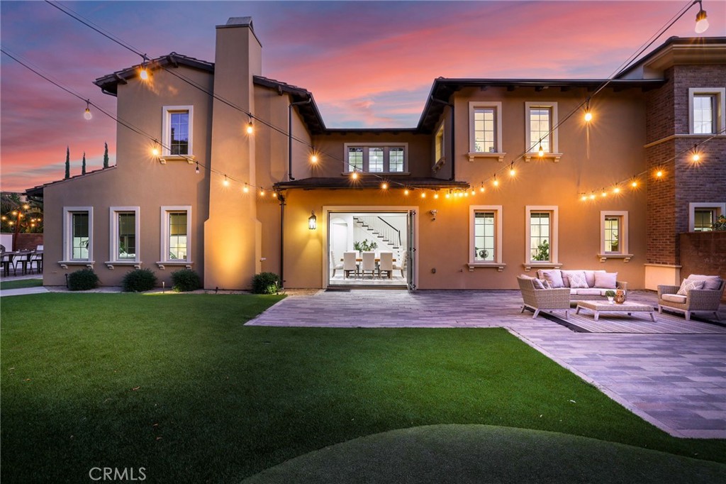 49 Saddlehorn Irvine, CA 92602 - Photo 68 of 73 a front view of a brick house with a big yard