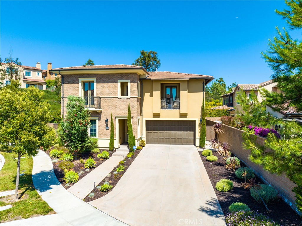 49 Saddlehorn Irvine, CA 92602 - Photo 70 of 73 a front view of a house with a yard