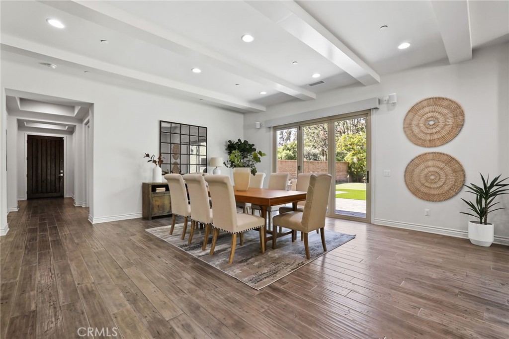 49 Saddlehorn Irvine, CA 92602 - Photo 7 of 73 a view of a dining room with furniture window and wooden floor