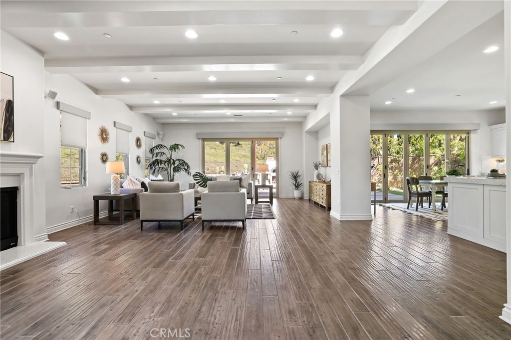 49 Saddlehorn Irvine, CA 92602 - Photo 8 of 73 a living room with furniture and a wooden floor