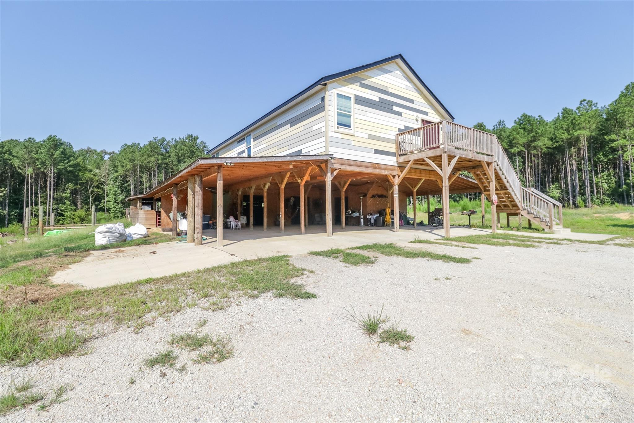 0 Shaw Avenue Waxhaw, NC 28173 - Photo 14 of 18 front view of a house with a yard