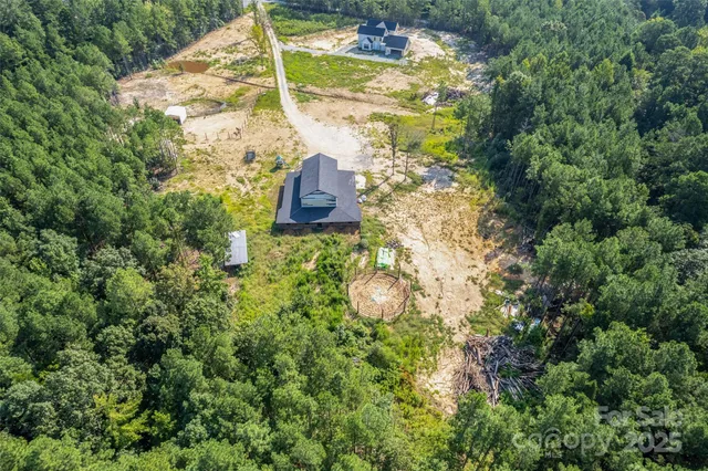 a view of outdoor space with deck and trees