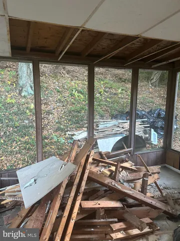 a view of a room with a large window